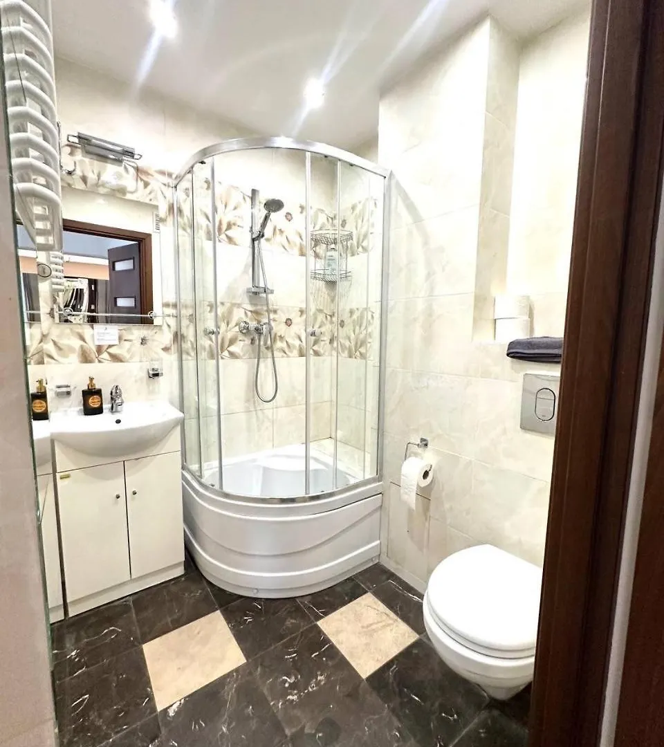 Ohmyhome-Zlota View Apartment Warszawa